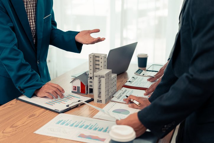 Real estate investors considering a multi-unit property.